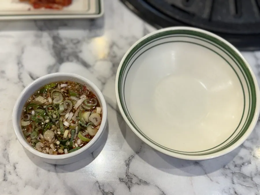 Basic setup with kimchi, shredded green onion, and radish