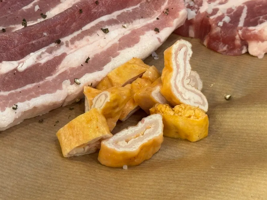 Thick-cut pork neck served