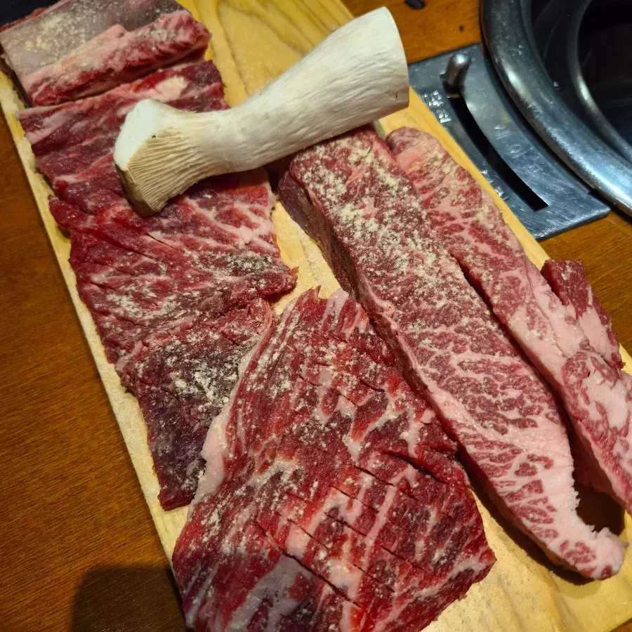 Raw flower short rib and fresh rib showing marbling