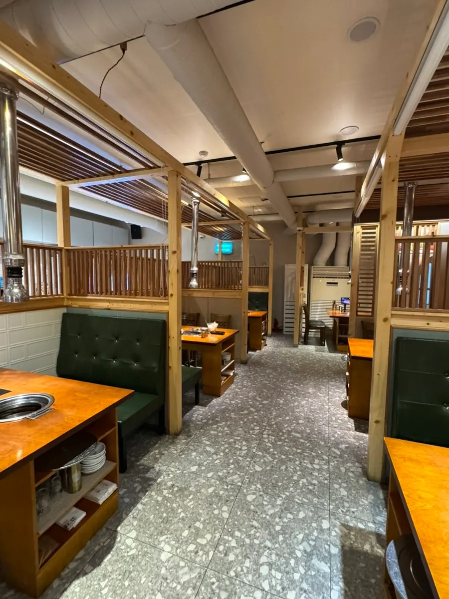 Private table screened off front and back