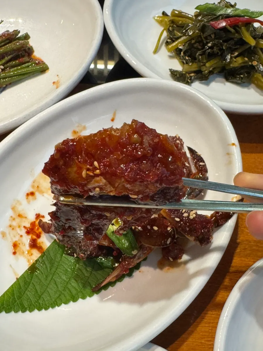 White kimchi and seaweed salad side dishes