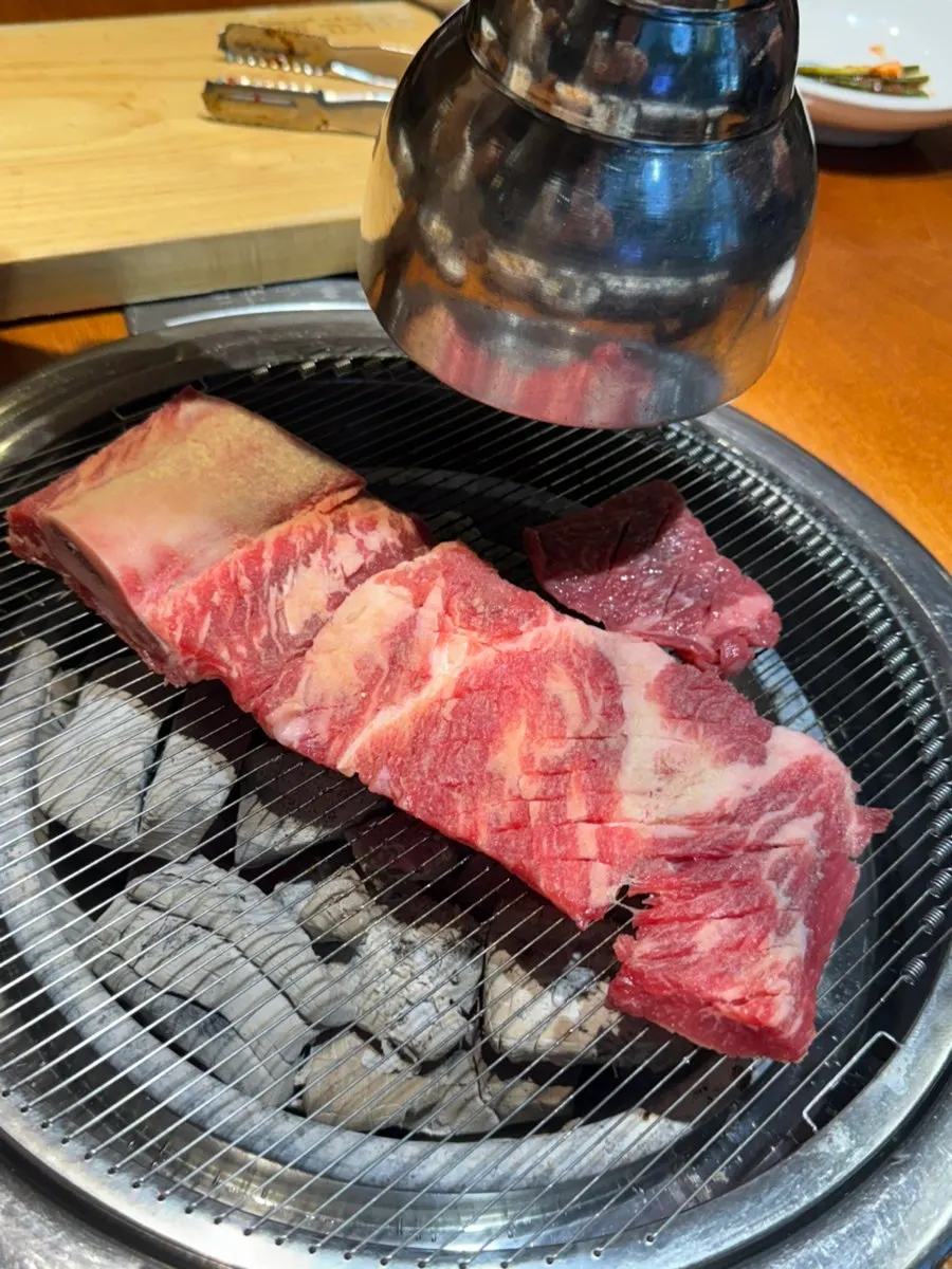 Skirt steak grilled golden brown with mushrooms