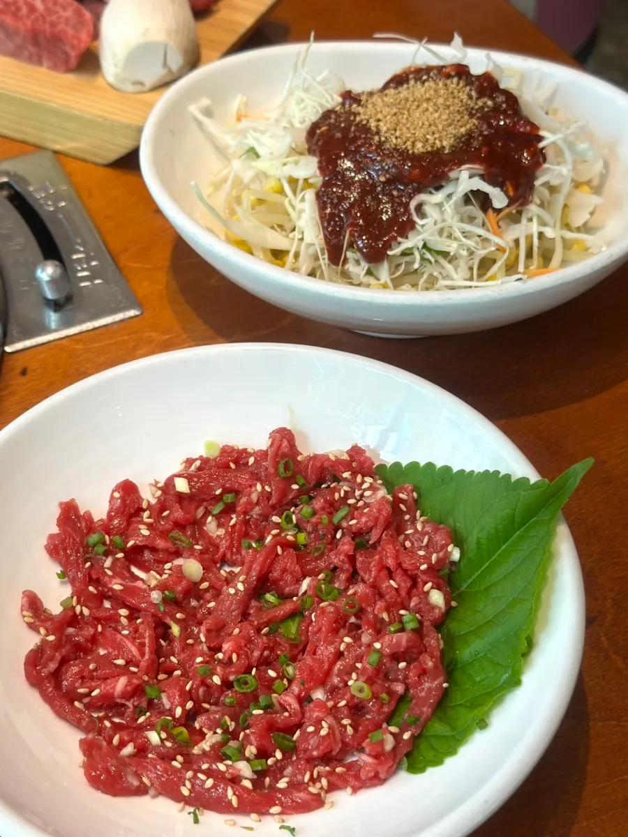Crunchy cabbage mul-kimchi alongside grilled meat