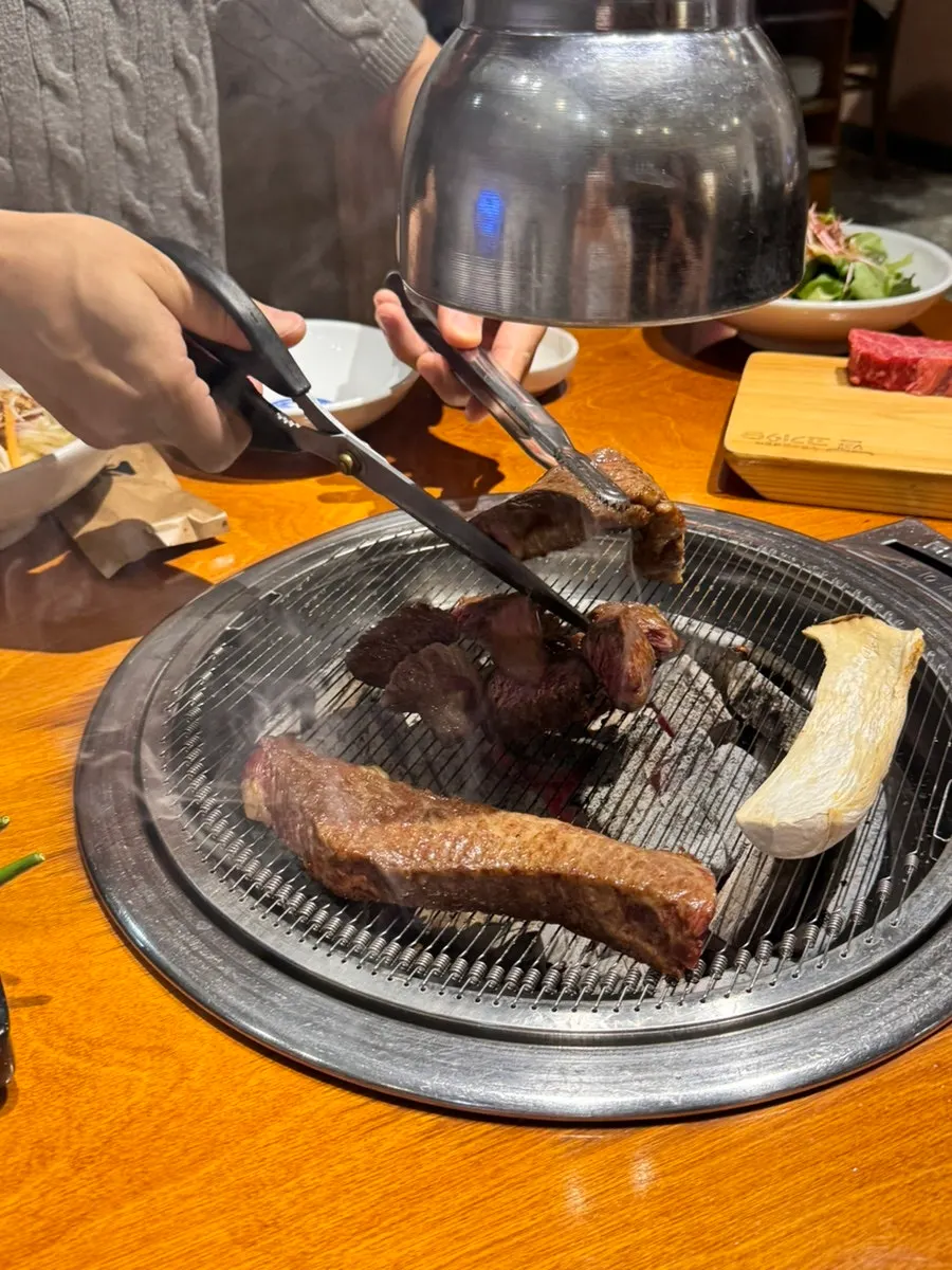Close-up of flower short rib being grilled