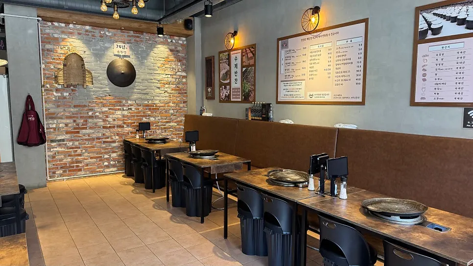 Standalone ground-floor restaurant entrance and dedicated parking area