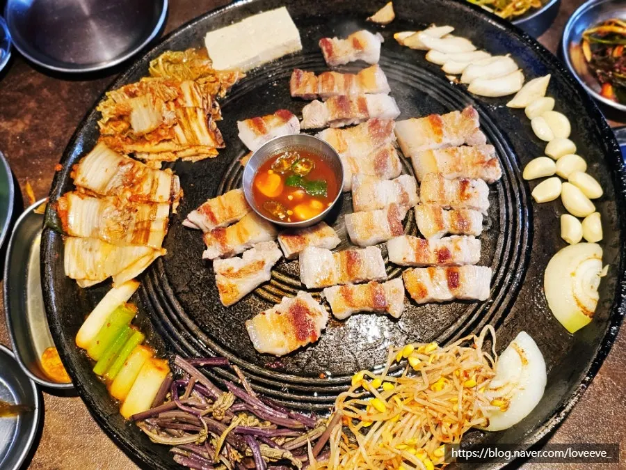 Pork belly, kimchi, and mushrooms cut into bite-sized pieces