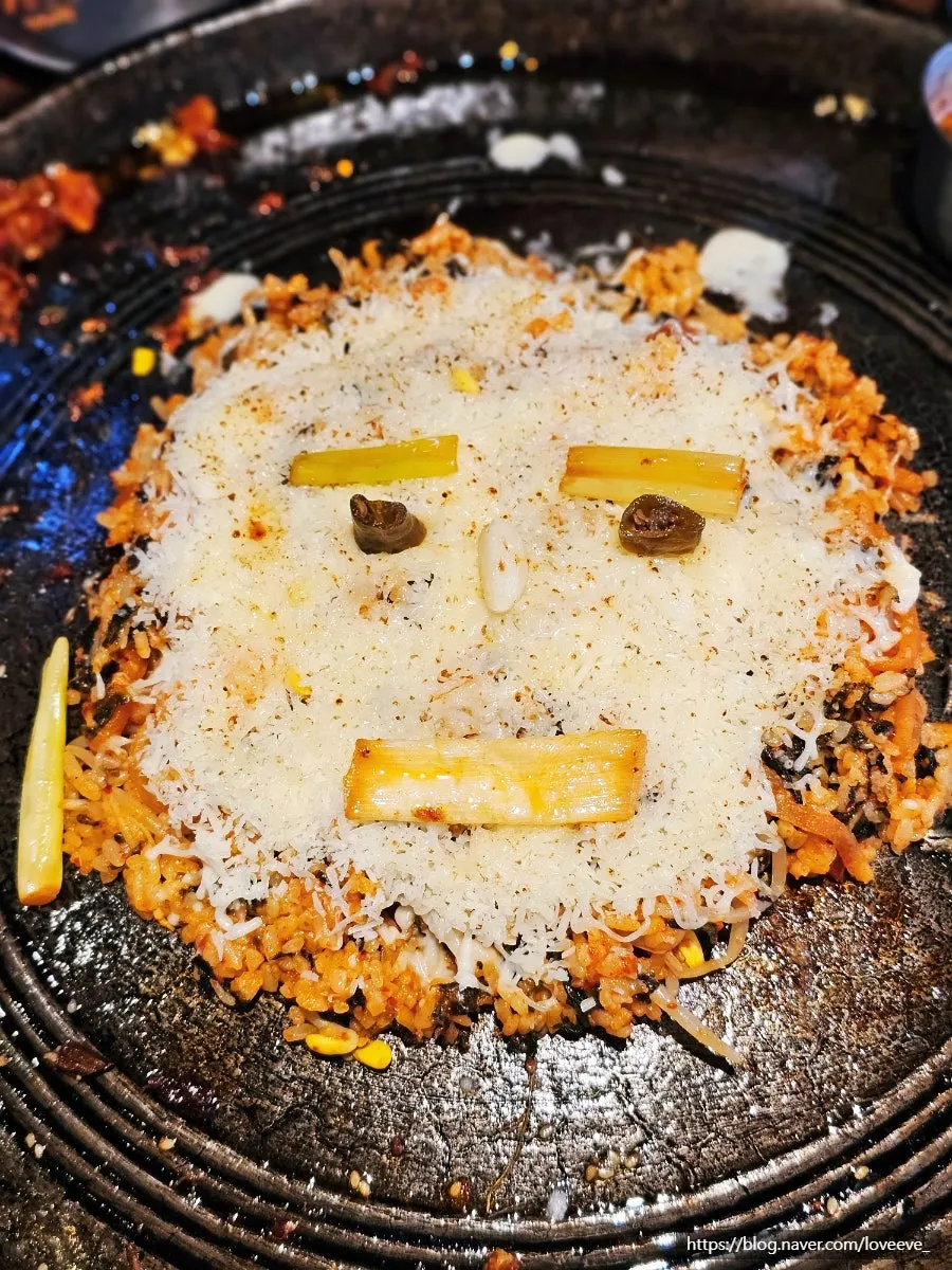 Radish kimchi fried rice topped with melted cheese