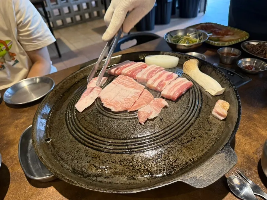 Plate of myeongi namul and wrap greens