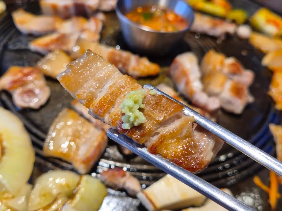 Pork belly topped with salt and wasabi