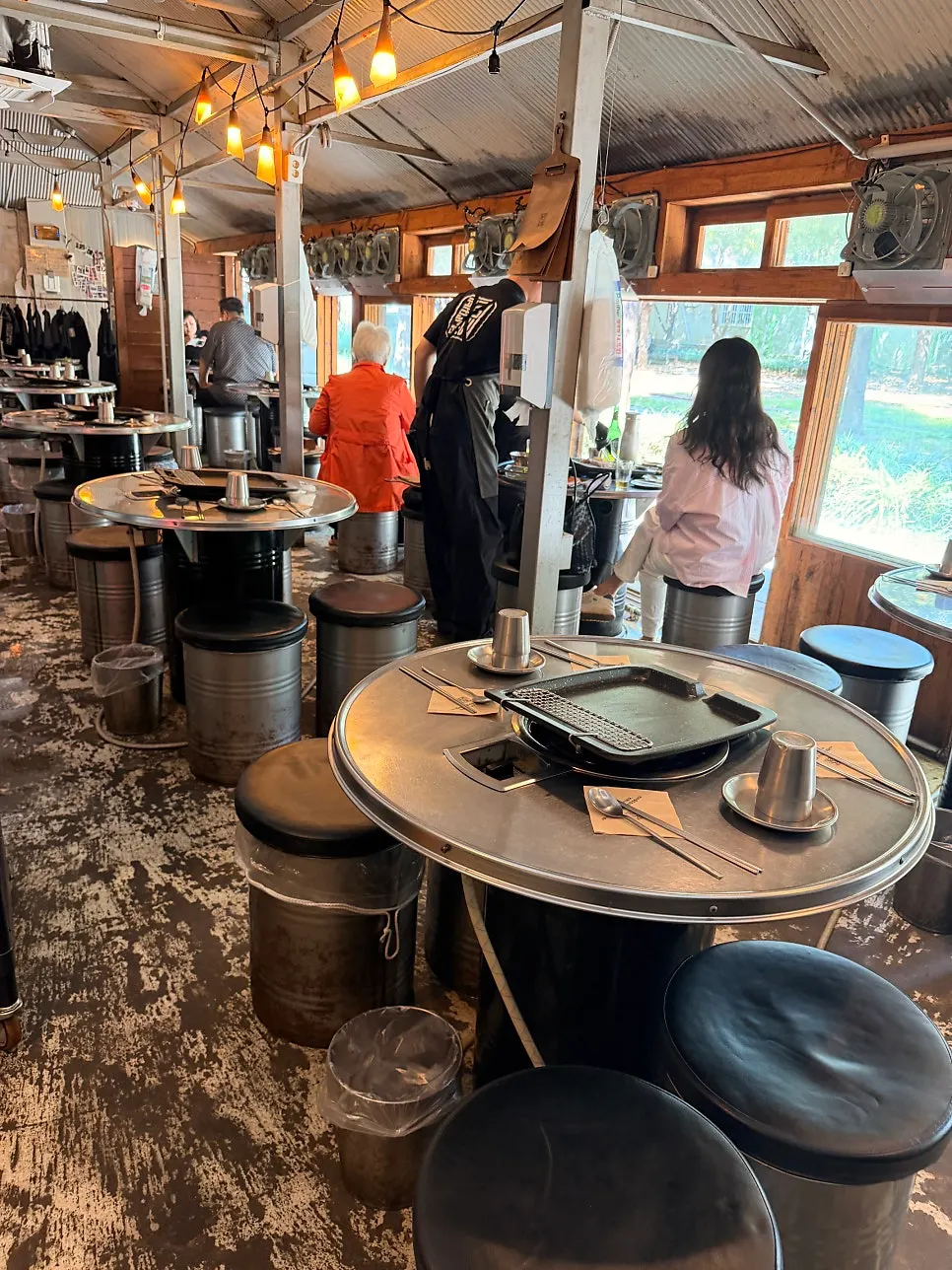 Window-side table with the restaurant's doors open