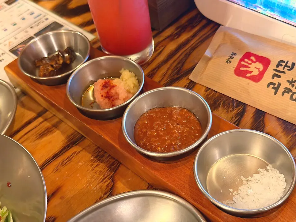 Table setting of side dishes to pair with the meat