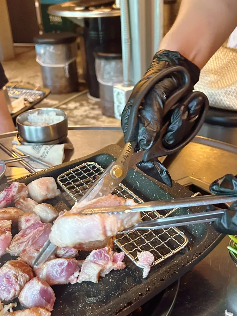 A piece of hanwoo grilled by staff