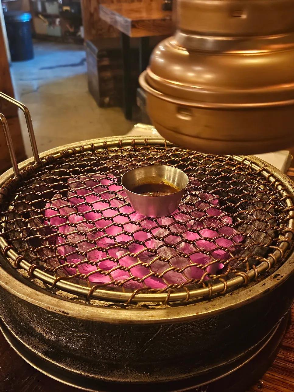 Charcoal brazier brought to the table