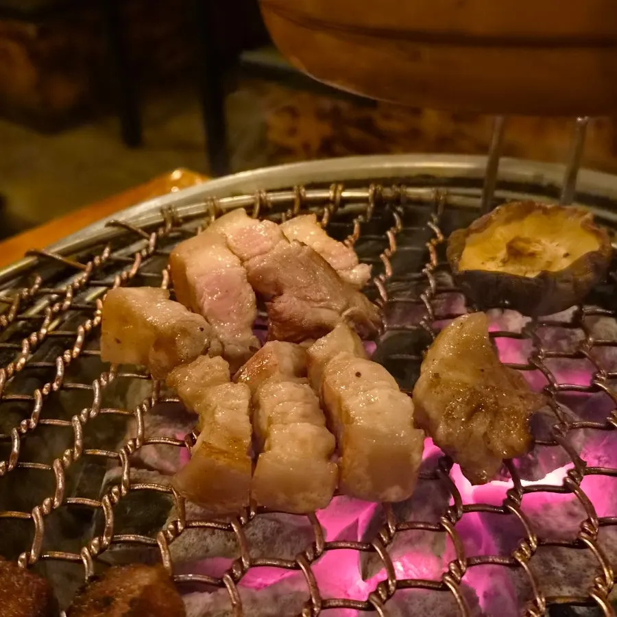 Raw galbisal dipped in myeoljeot sauce
