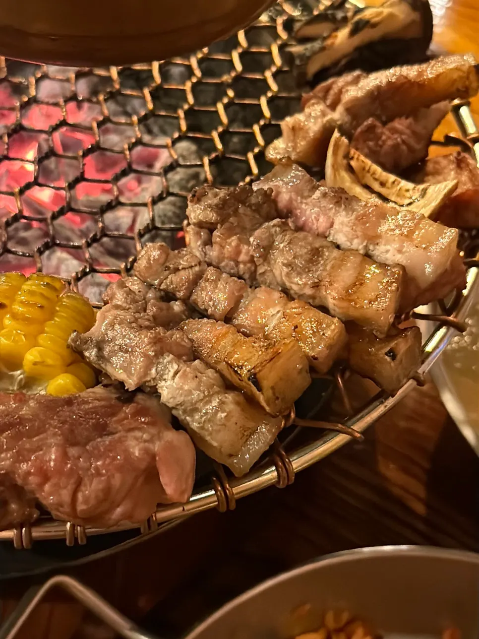Cross-section of grilled pork belly with the skin attached