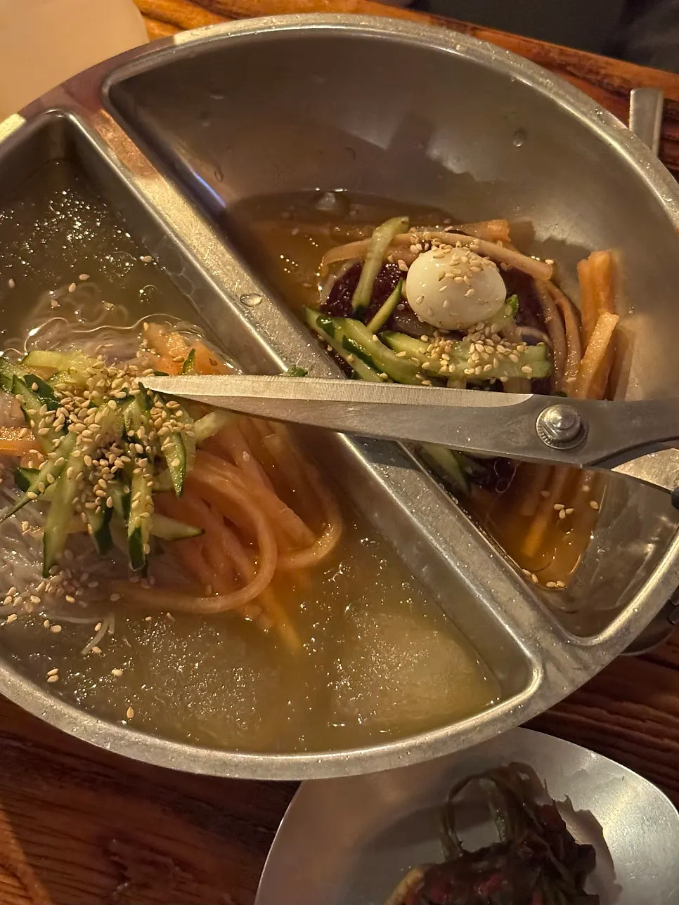 Half-and-half naengmyeon combining bibim and mul cold noodles