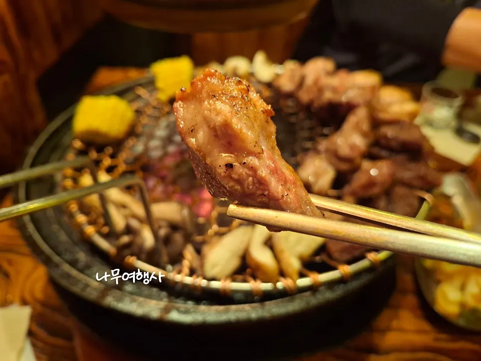 Close-up of grilled pork neck with just the right amount of fat