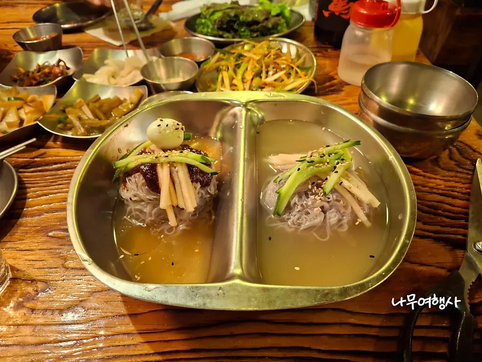 Half-and-half naengmyeon with bibim and cold broth