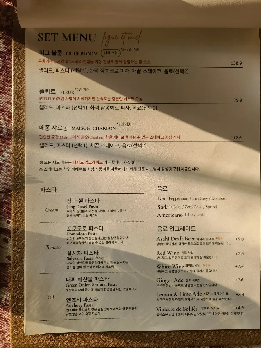 Table at Pig Mie-eul seated with a baby