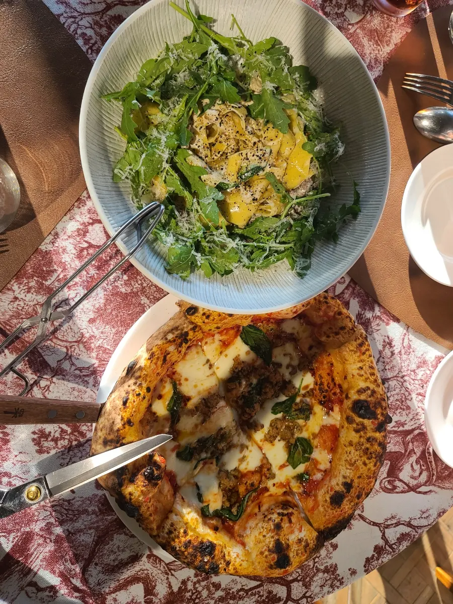 Salsiccia pizza piled with cheese and toppings
