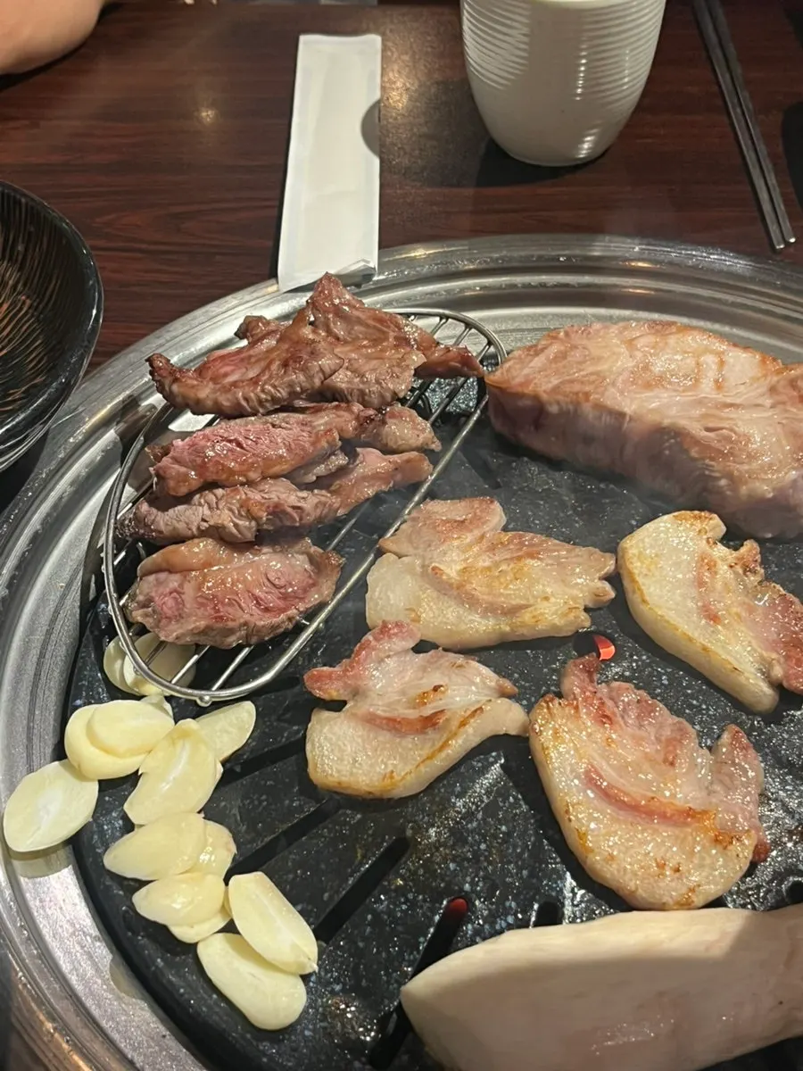 Grilled beef rib finger set up on a rack