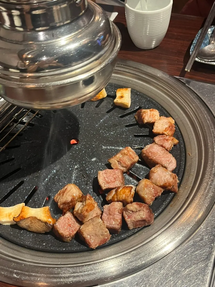 Fresh pork neck cut into bite-sized cubes