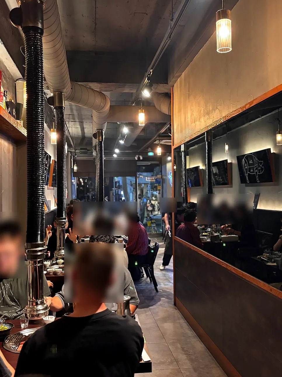 Interior of Gogi Salon with generously spaced tables