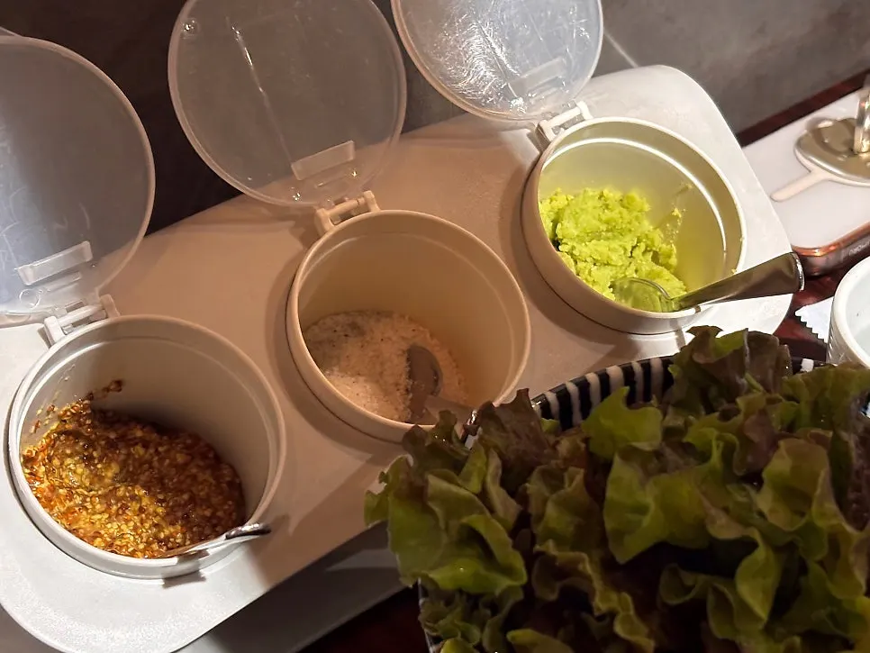 Salt, fresh wasabi, and whole grain mustard sauce setup