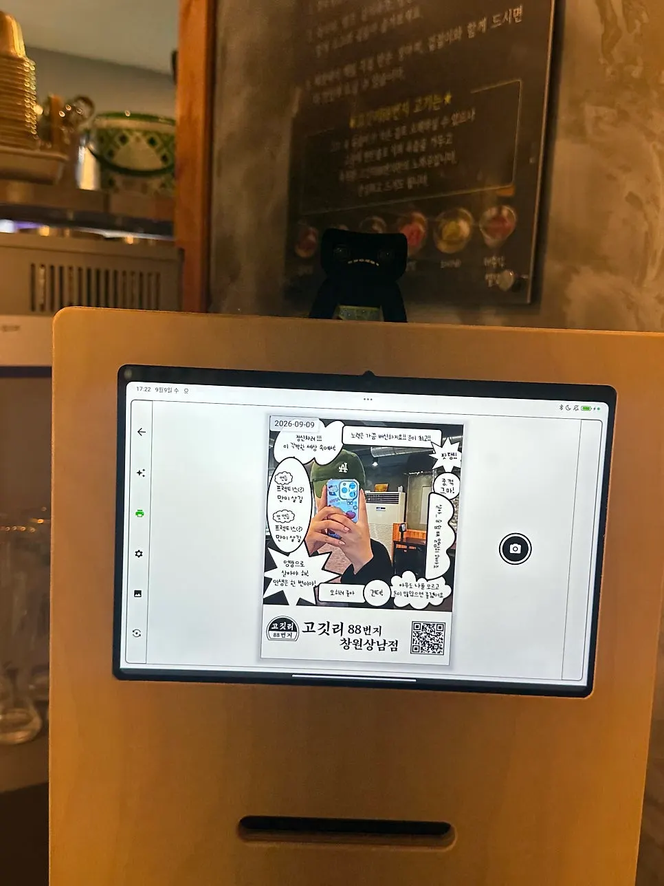 Instant photo printer inside the restaurant