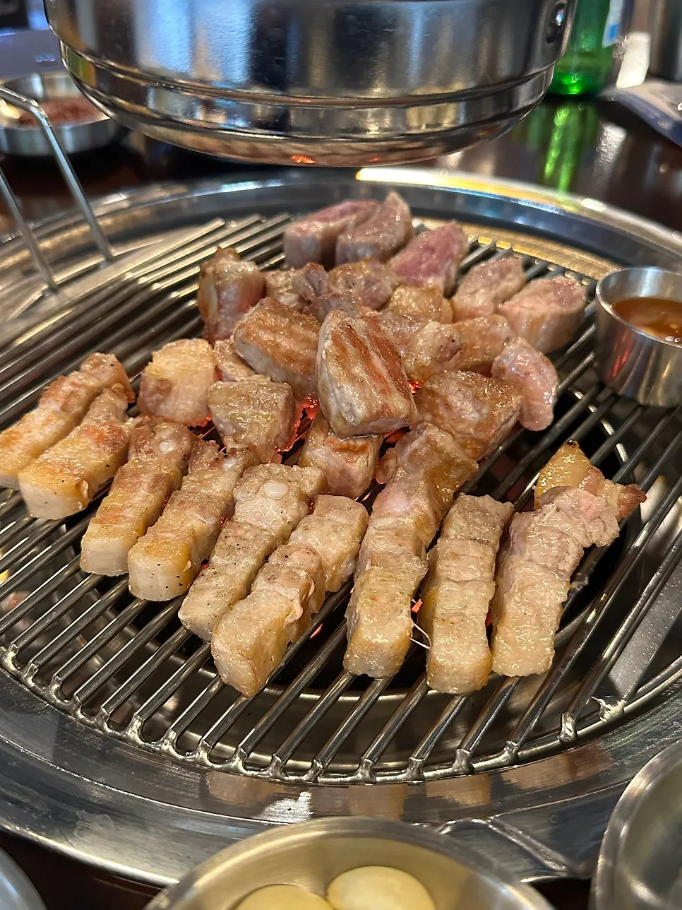 Assorted meat grilling on the grill plate