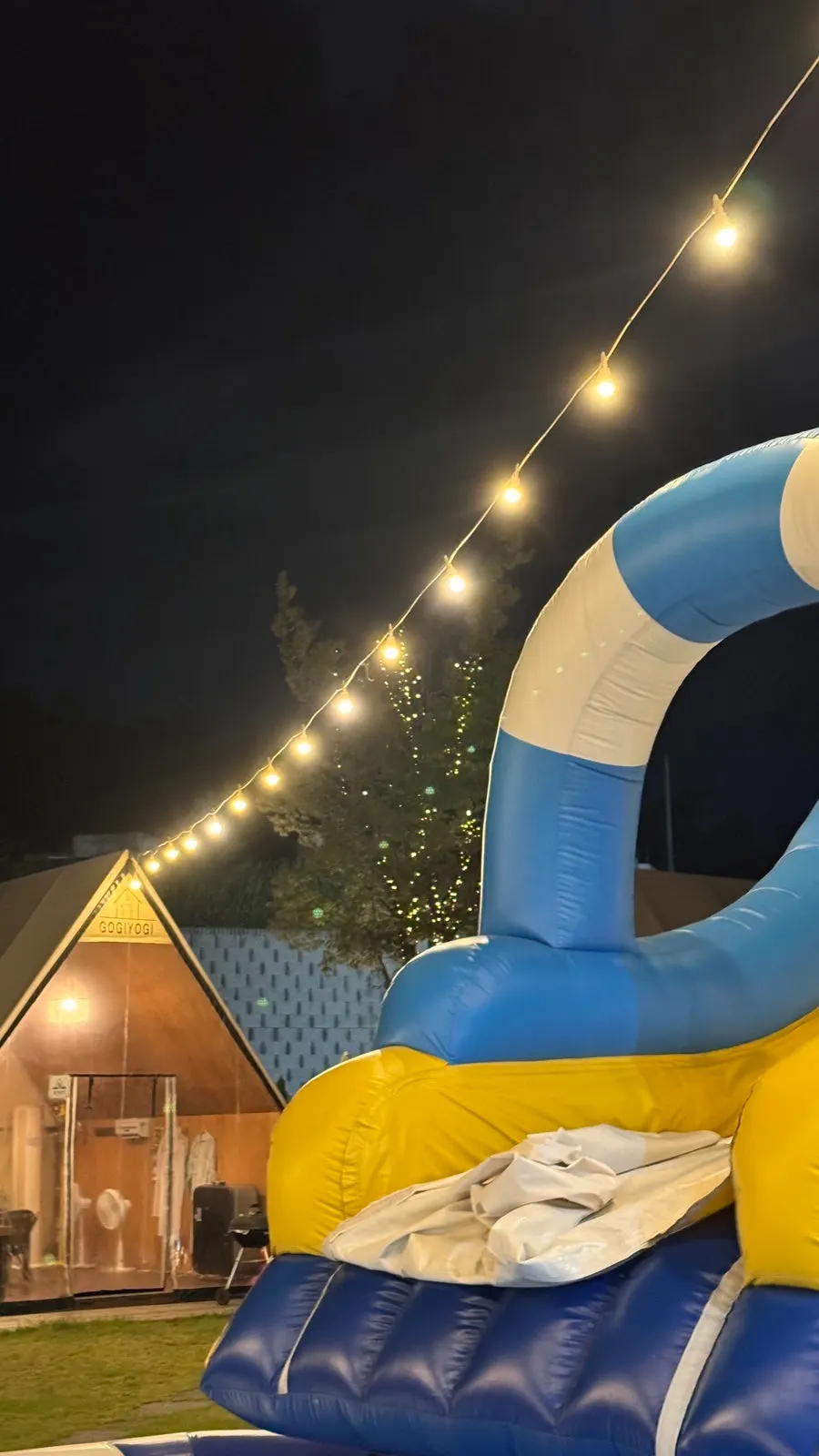 A child playing in the water play area