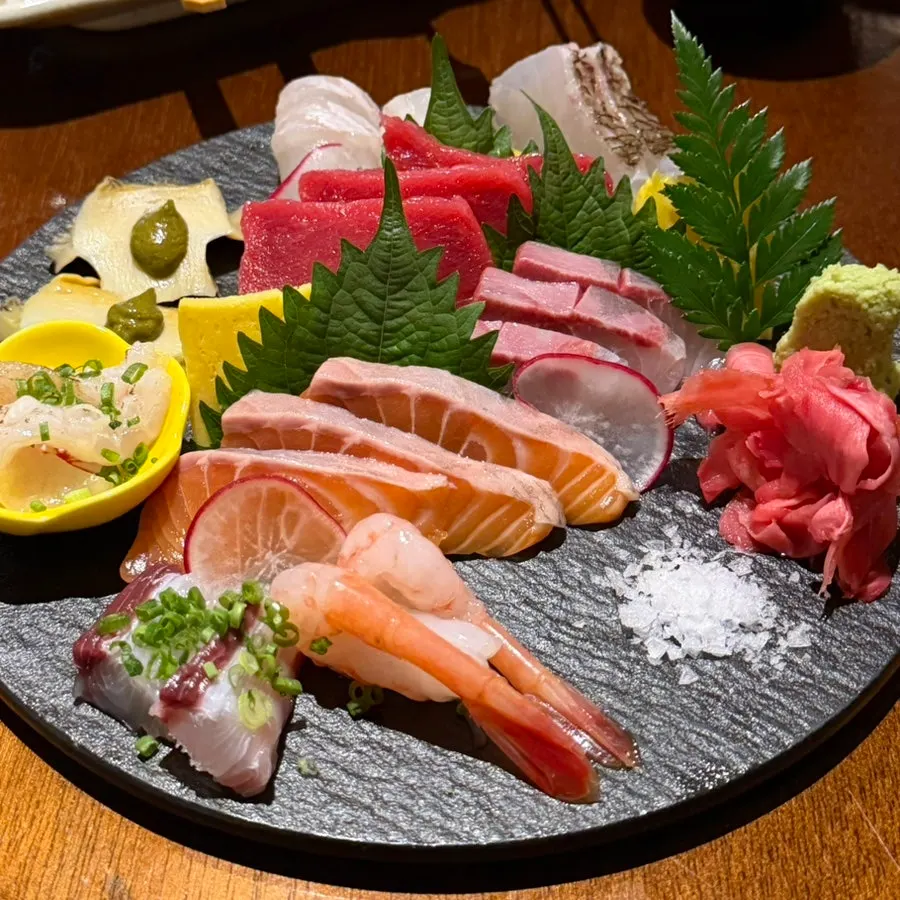 Assorted aged sashimi plated like a bouquet