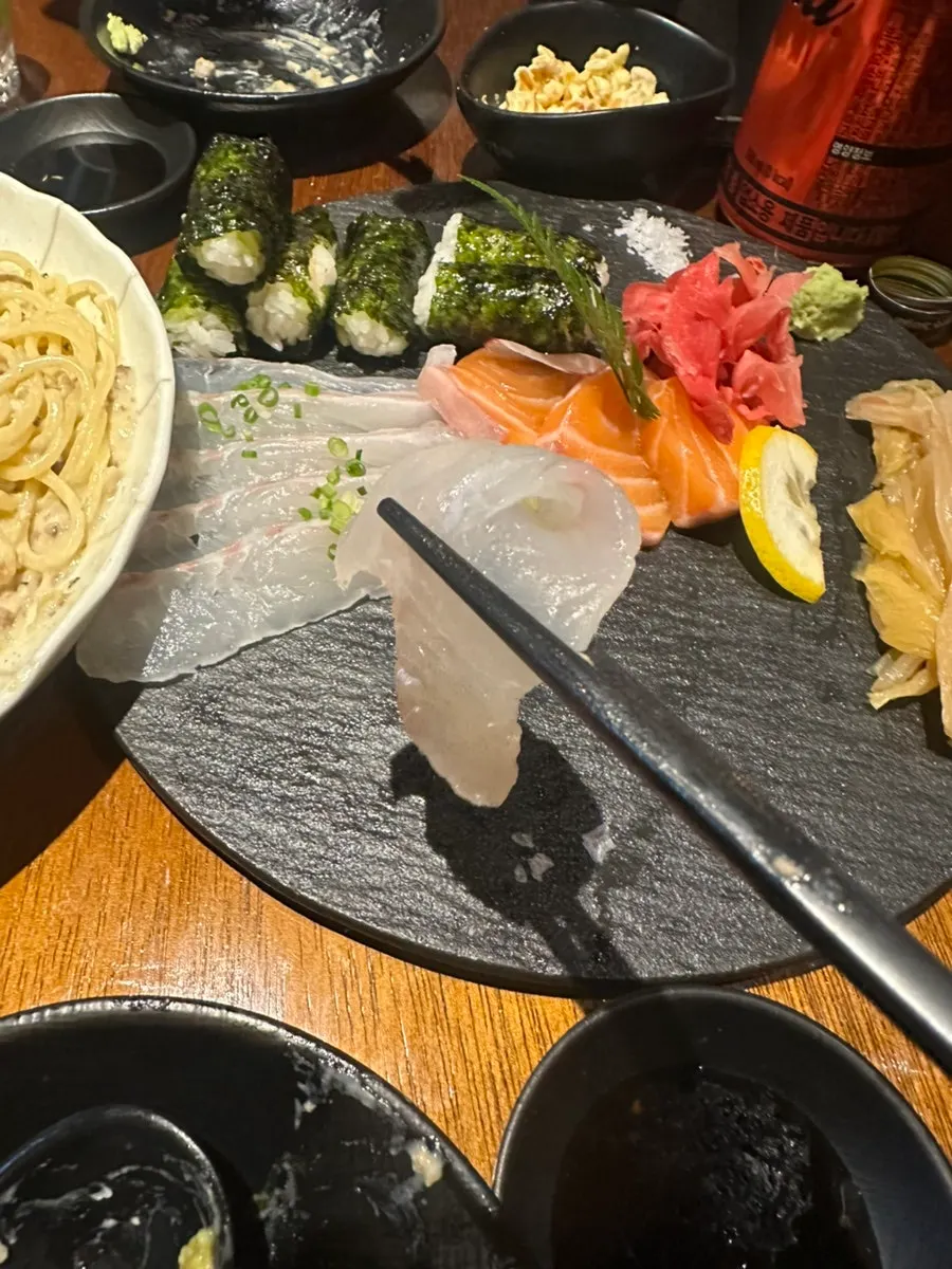 Thickly sliced flounder sashimi with salted gimbap
