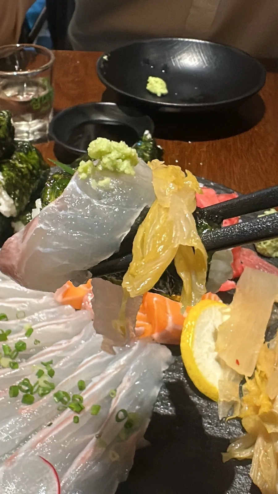 Flounder sashimi and aged kimchi placed on gimbap