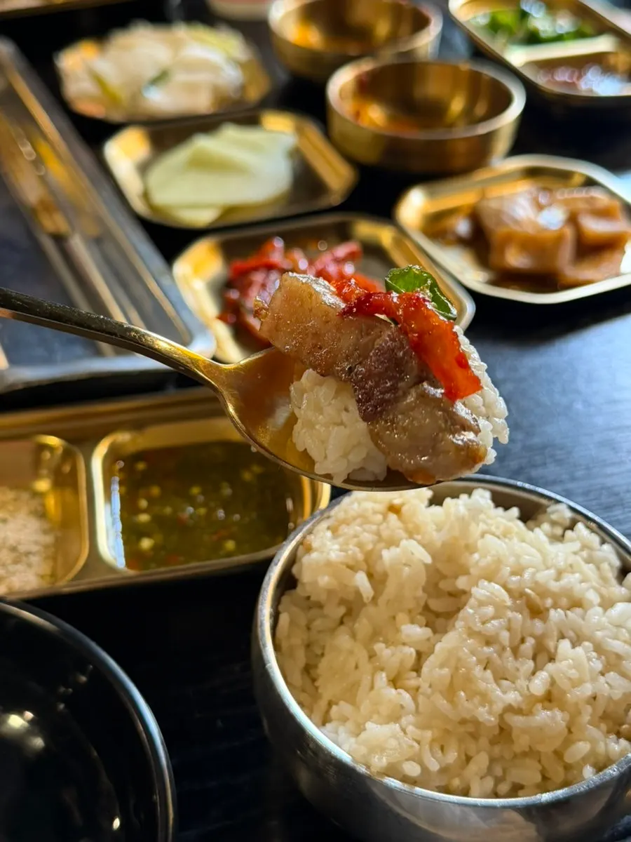 A piece of pork belly with smoky char