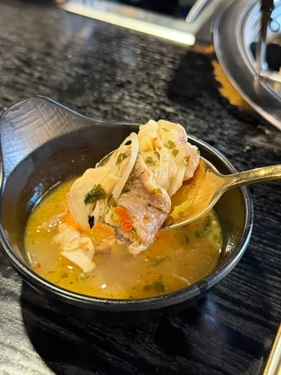 Large, plump shrimp inside the tom yum sul-guk