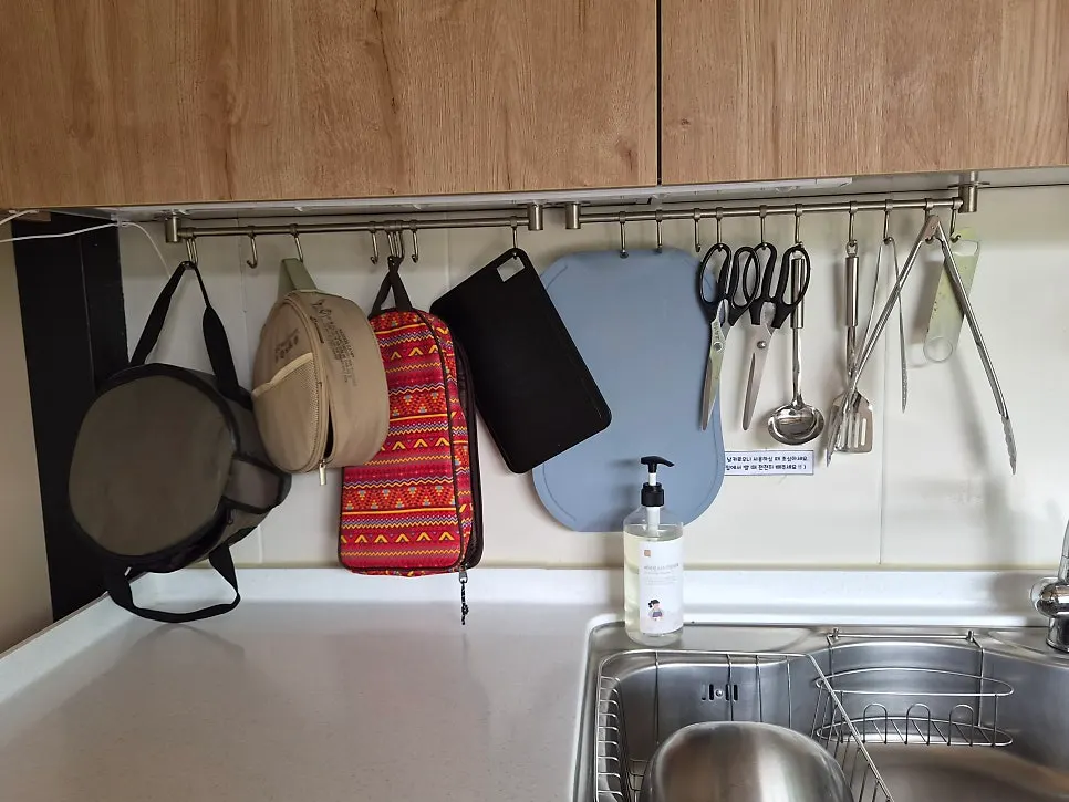 Cooking area with microwave and dishware