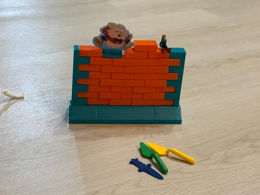 Family playing the brick game together