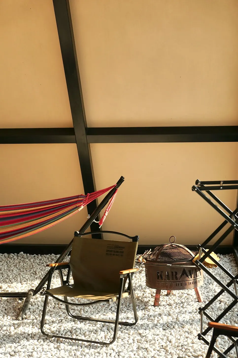 Camping zone with a hammock and fire pit