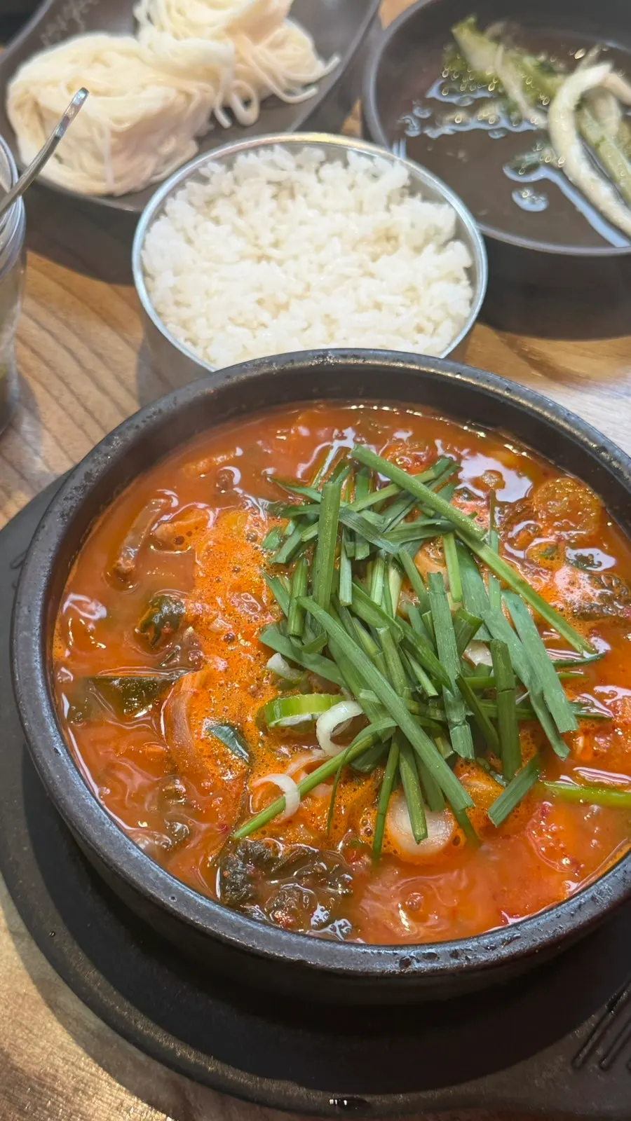 Close-up of the sharp, spicy broth of the spicy sundae soup