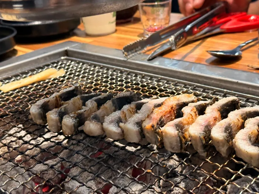 Table after a satisfying eel all-you-can-eat meal