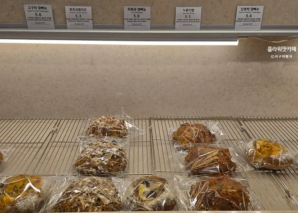 Bread display case with campagne and salt bread