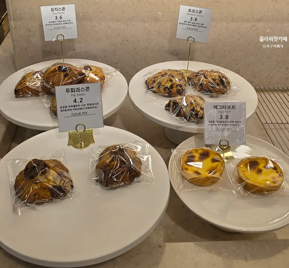 Scones and egg tarts on display at Flowerpot Cafe
