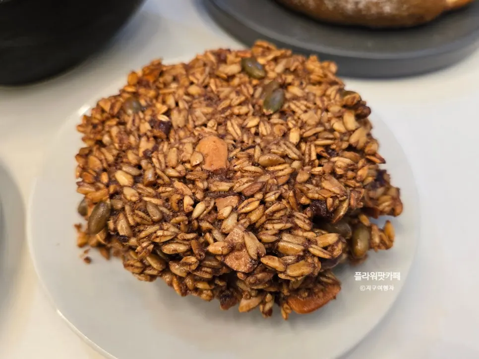 Palm-sized oatmeal cookie with nuts