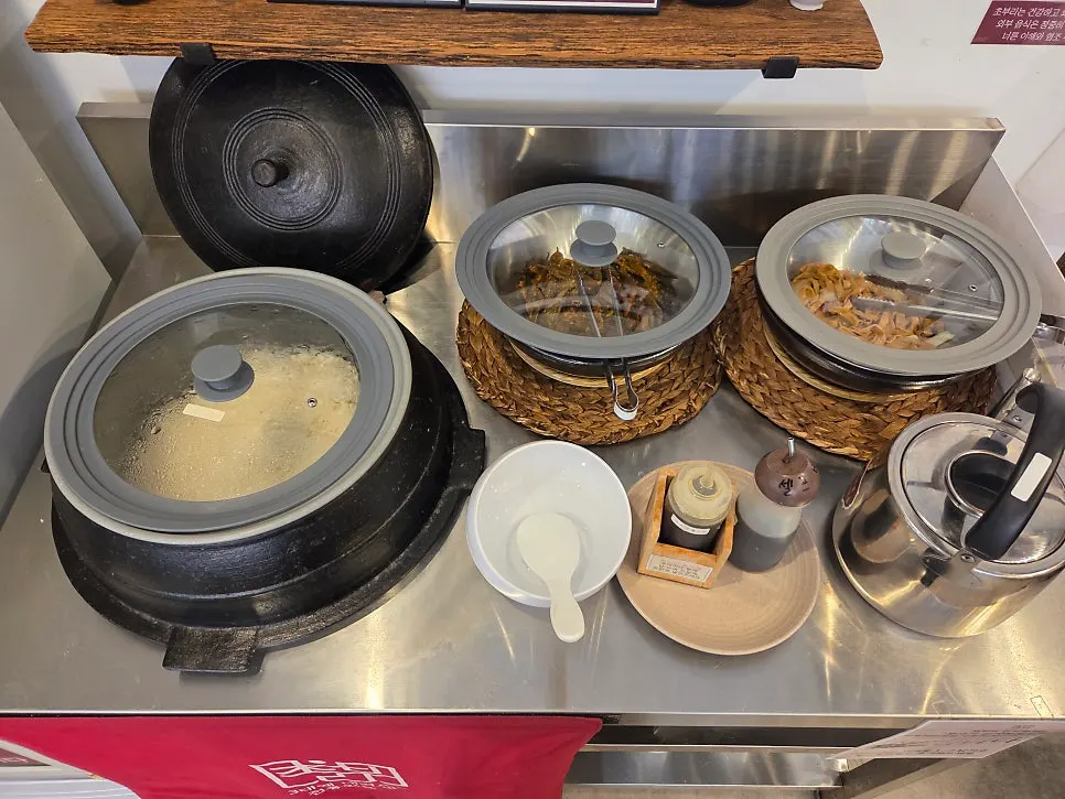 Basic side dishes neatly arranged at the self-serve bar