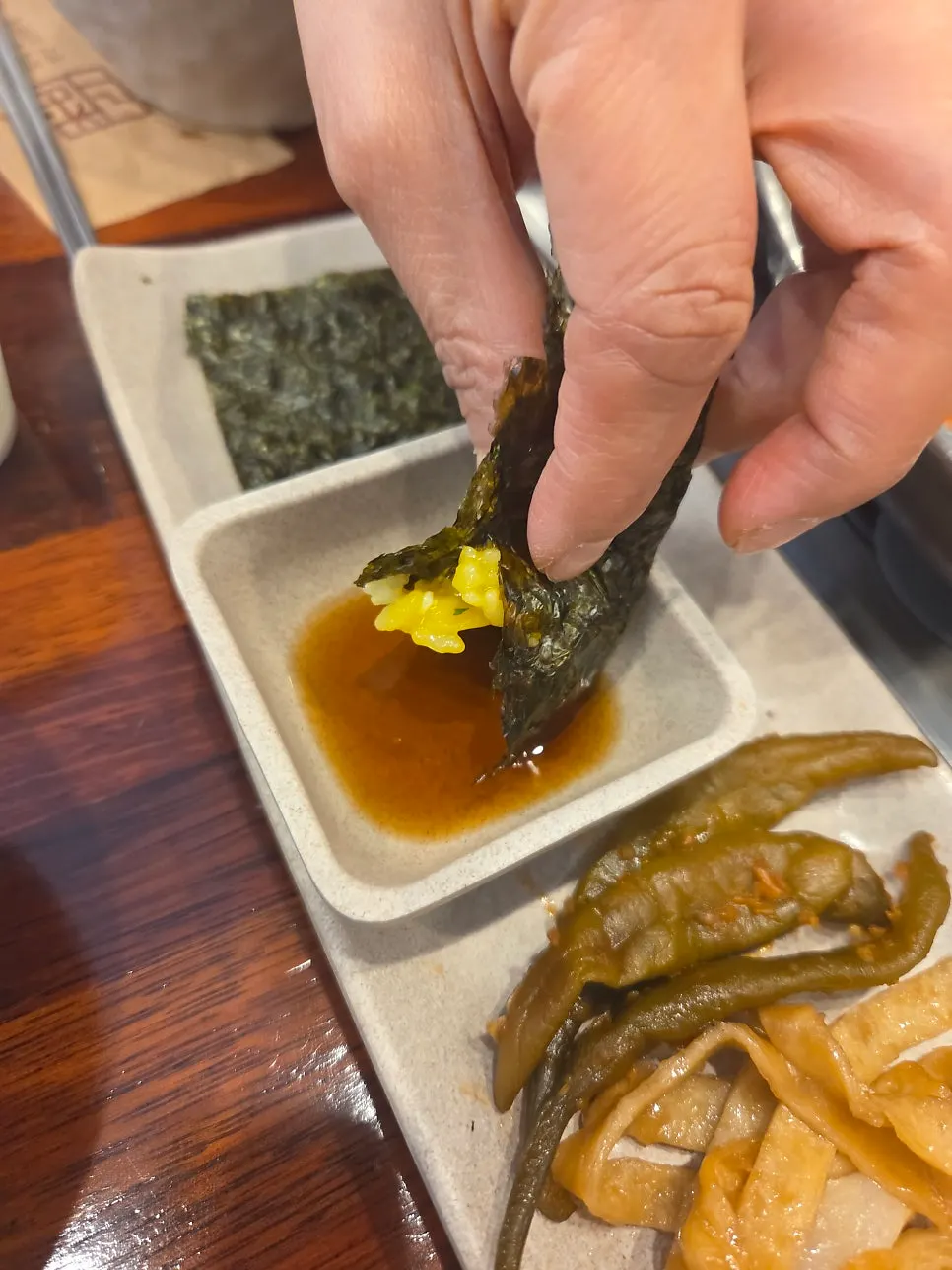 Perilla oil fried egg wrapped in roasted seaweed