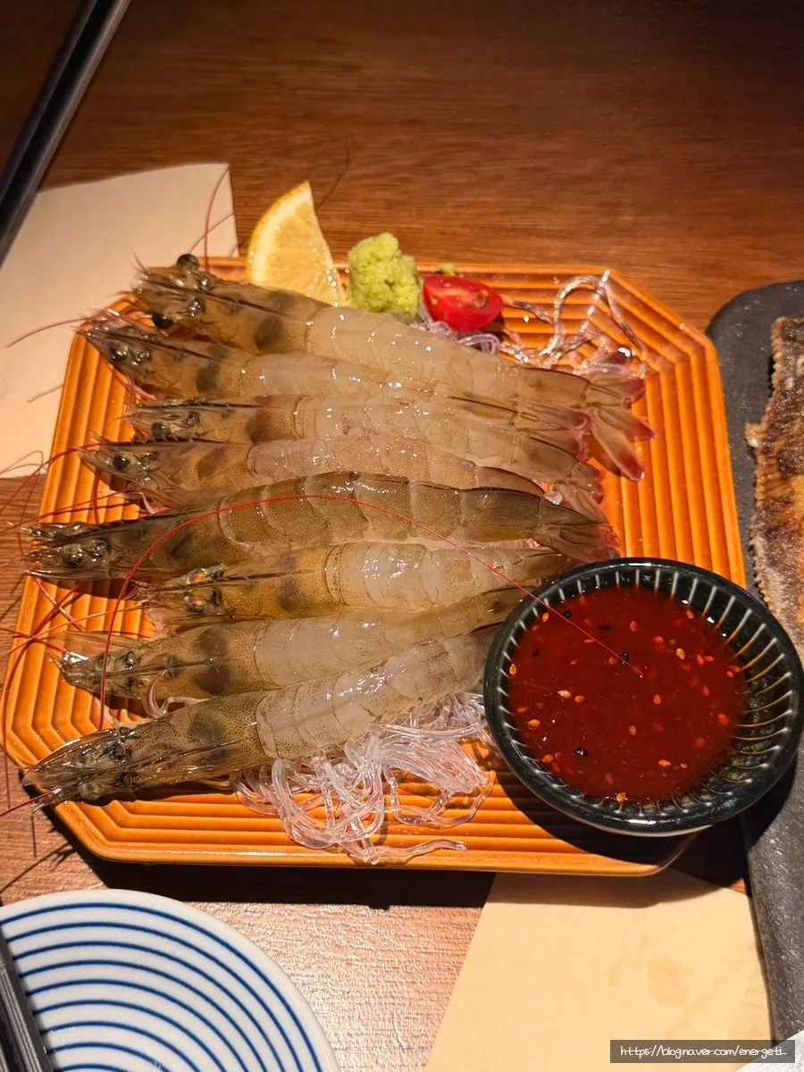Plate of grilled fish enjoyed as a drinking snack
