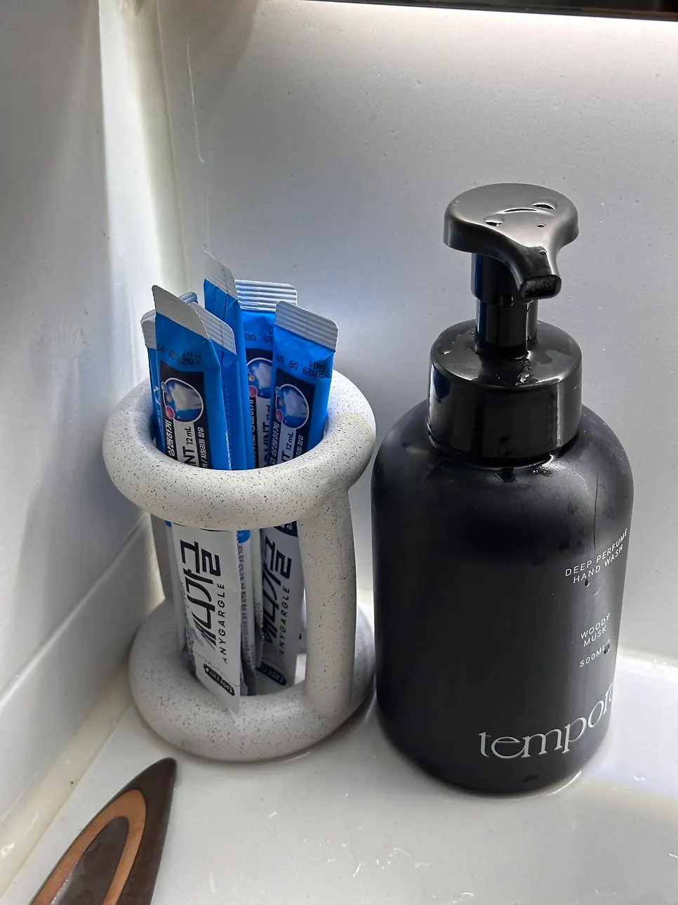 Restroom with individually wrapped mouthwash available
