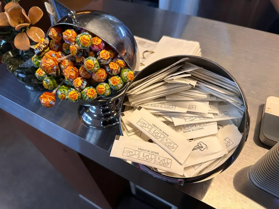 Candies and individually wrapped dental floss at the checkout counter