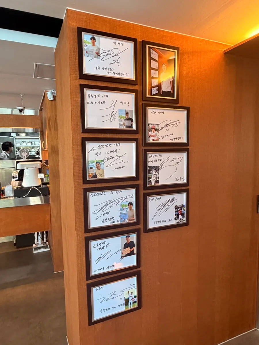 Autographs from famous athletes on the restaurant wall